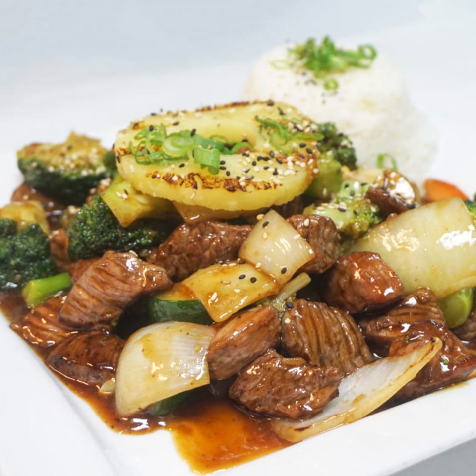 Grille One Nine's Asian fusion beef and broccoli with pineapple, onions, and rice.